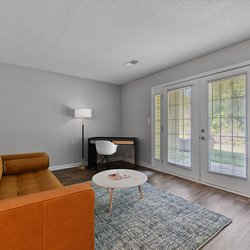 living room at Premier Apartments located in Austell, GA