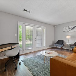 living room at Premier Apartments located in Austell, GA