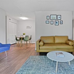 living room at Premier Apartments located in Austell, GA