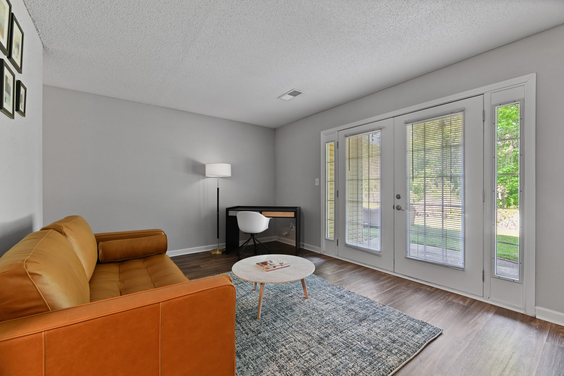 living room at Premier Apartments located in Austell, GA